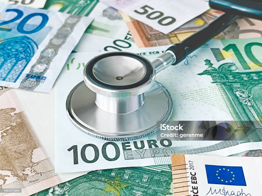 Financial surveillance Stethoscope on Euro bills symbolizing financial surveillance Euro Symbol Stock Photo