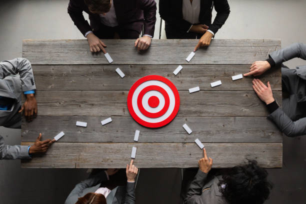 istock Business team pointing to target 1401273886