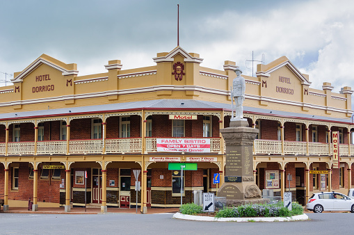 Dorrigo, NSW, Australia - March 11, 2018: The heritage listed Hotel Dorrigo and the War Memorial in the intersection of Waterfall Way and Hickory Street