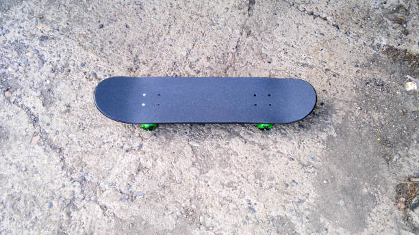 istock Skateboarding on the pavement close-up. The concept is an active pastime. 1401278645