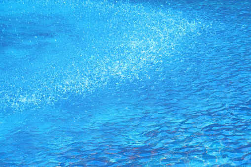 Exhilarating splashes on a light blue background