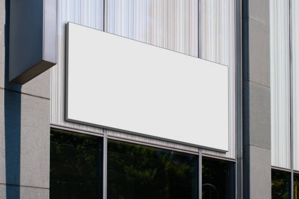 istock blank billboard on shop entrance, empty sign on store front mockup 1401279494