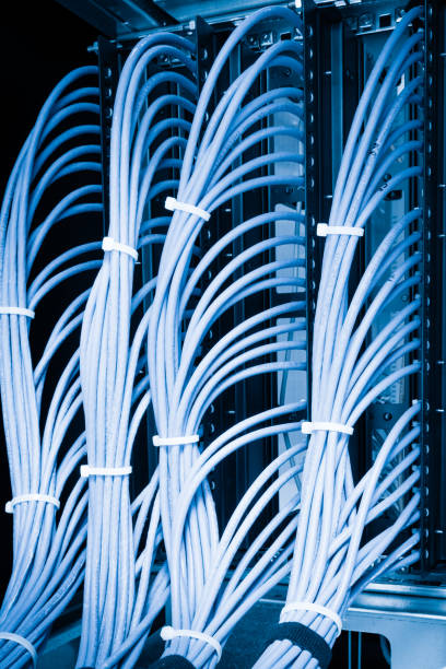 istock large group of UTP cables, Ethernet cables in rack cabinet 1401280985
