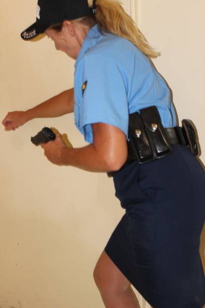 istock uniformed female police officer 1401284250