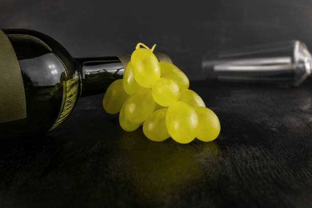 istock A bottle of wine white grapes and a glass 1401286326