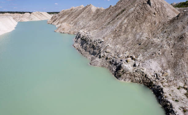 istock blue water river running through an industrial chalk quarry 1401286528