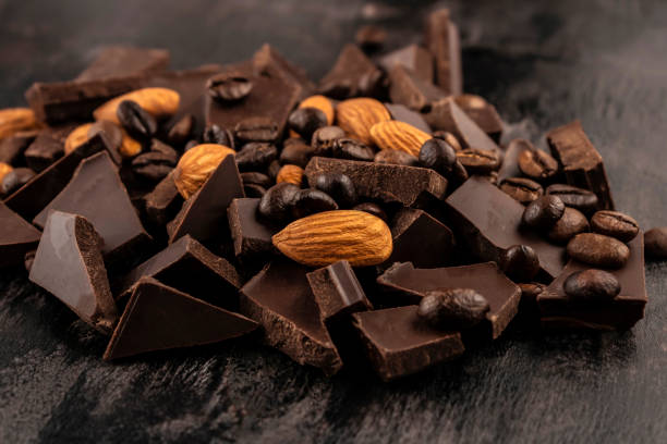 istock crushed dark chocolate with almonds and coffee beans 1401286683
