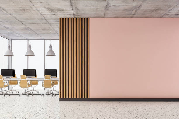 istock Empty office interior with copy space and work desks on the terrazzo floor and paneled wall 1401287080