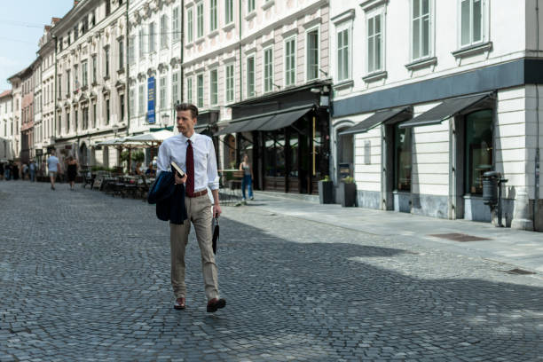 istock A young hipster man with a mustache on a walk around the city 1401295504