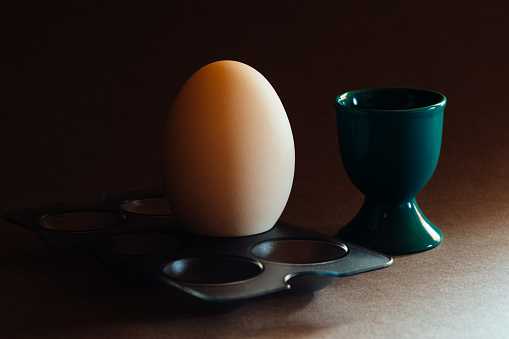 Chinese goose egg and eggcup.