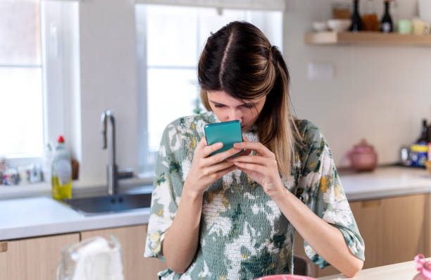 istock A visually impaired young woman  using smart phone. 1401302820