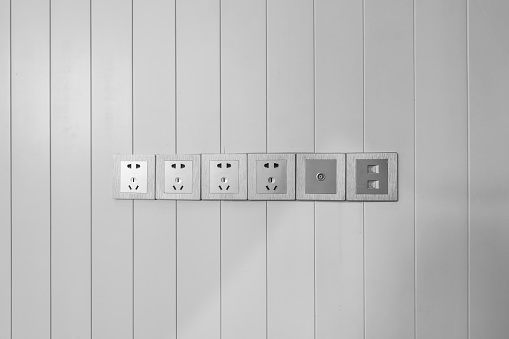 Switch socket on vertical wall