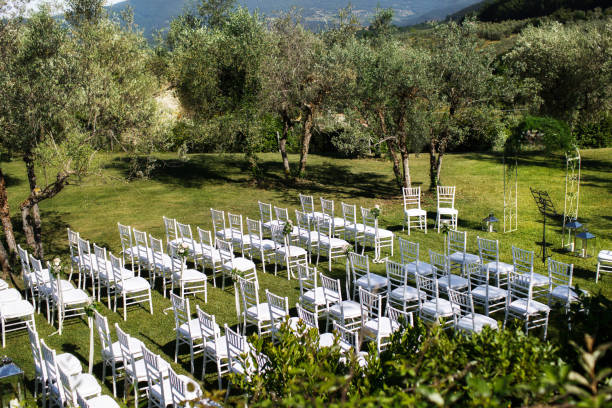 Outdoor wedding ceremony around the green mountains. Villa Bordoni