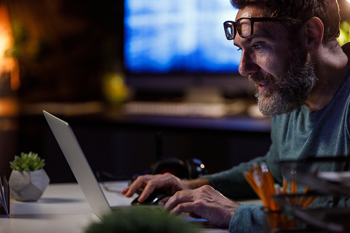 Senior Computer Programmer Mature Computer Programmer Working Late And Coding Stock Photo ...