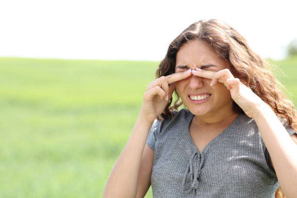 istock Woman scratching eyes in a wheat field 1401311862