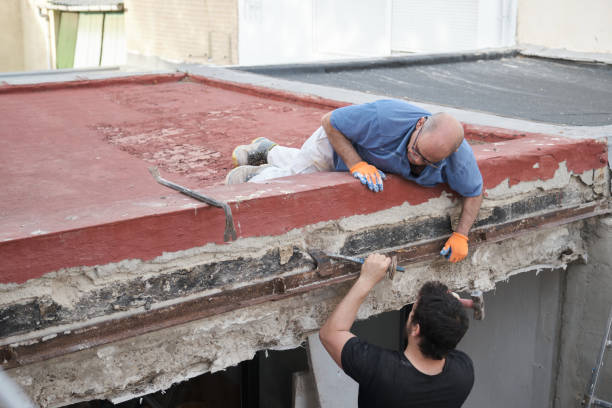 istock Two masons removing old metal beams in a construction house. 1401312644