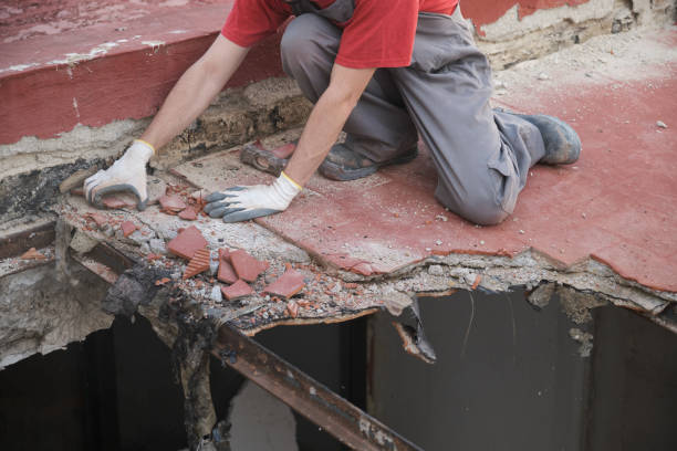 istock Unrecognizable man pulling the roof of a house down. 1401312666