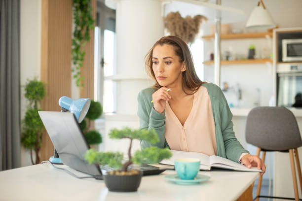 istock Young businesswoman working from 1401315858