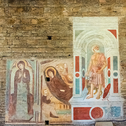 The frescoes complement the monastery's architecture, enhancing its sacred ambiance