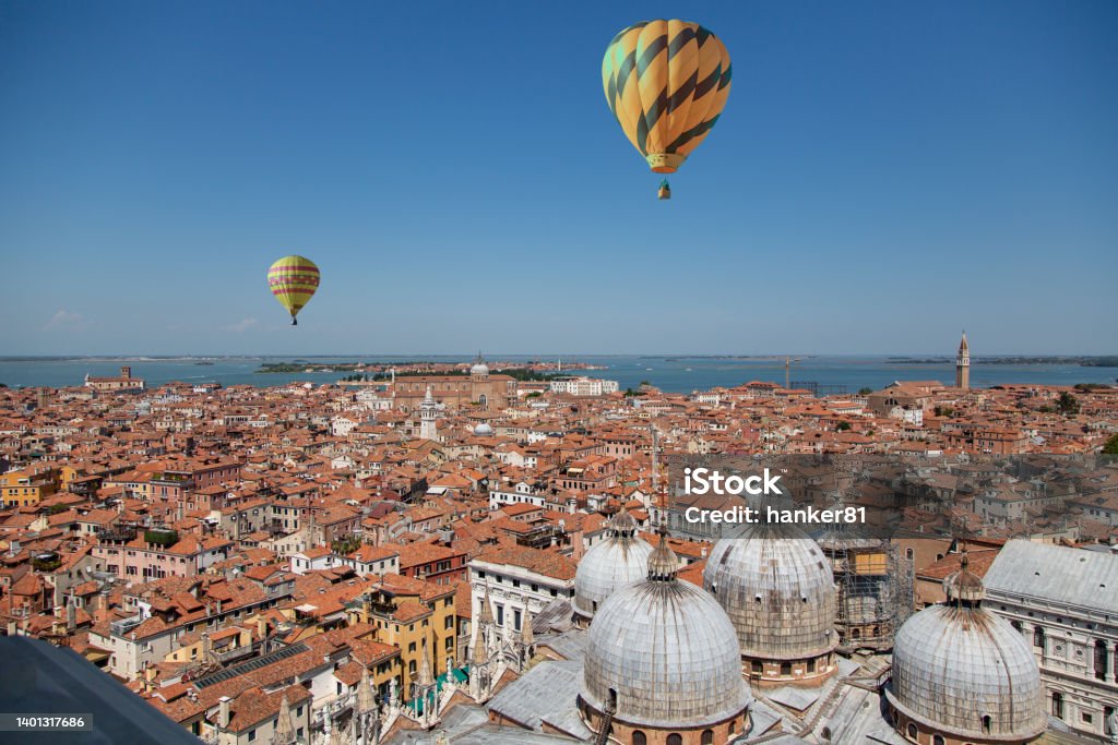 Venice in Summer with hot air balloons Balloons flying over the Scenic city of Venice Hot Air Balloon Stock Photo