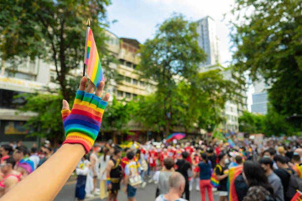 asian group of people celebrating the pride month on a pride event. - crowd community large group of people protest imagens e fotografias de stock