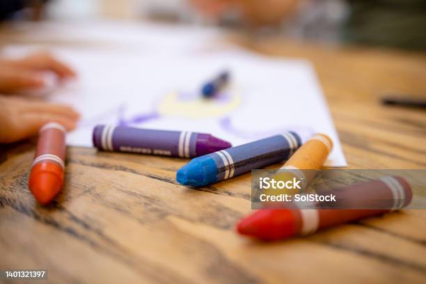 Colourful Crayons On Table Stock Photo - Download Image Now - Child Care, Crayon, Desk