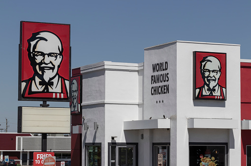 Indianapolis - Circa June 2022: KFC Fried Chicken restaurant. Kentucky Fried Chicken is offering Uber and Door Dash delivery and drive thru service.