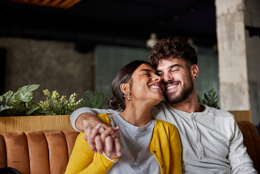 Happy couple embracing with great affection.