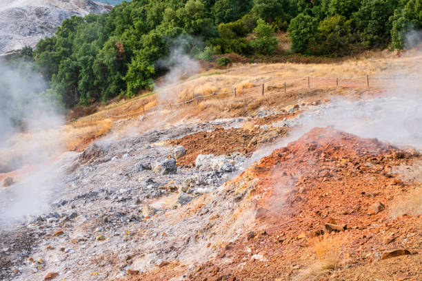 Colorful rocks in the Biancane Nature Park, a natural area with free access rich in geothermal wells, whose steam is used for the production of electricity