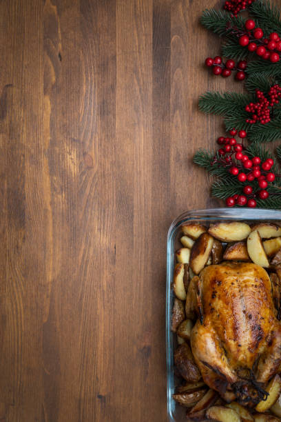 istock Roasted Christmas Chicken or Turkey on wooden background with copy space 1401326595