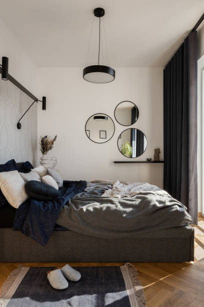 istock Modern bedroom with cozy bed 1401328272