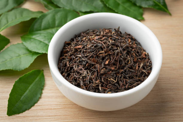 istock Bowl with dried Indian Ambootia Darjeeling tea close up 1401328320