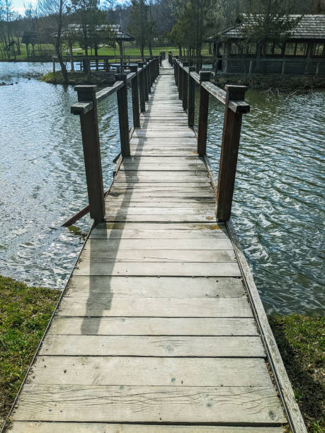 istock lake with gazebos and green grass 1401330552