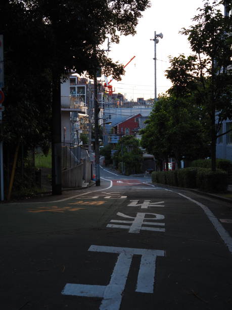 istock A Slope with Stope Sign in the Sunset Light in Tokyo 1401331507