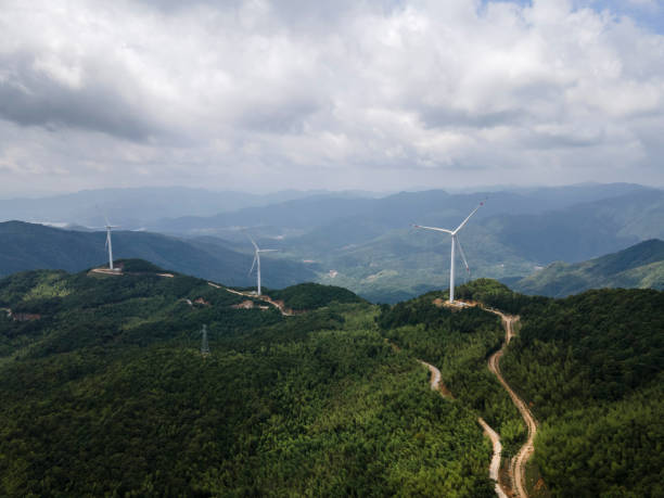 Aerial view of wind power on the top of the mountain Wind power at the top of the mountain in Fujian,China. low carbon economy stock pictures, royalty-free photos & images