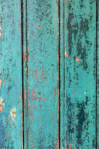 Worn out door macro, textured and weathered.
Taken from the ruins of an old barn in Belgium, Europe.