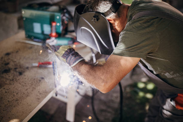 istock Welding worker, do the metal welding yourself 1401334447