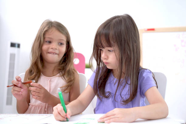 istock Children enjoy playing in classroom. 1401336353