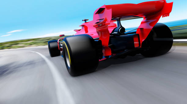 istock red race car driving on a race track 1401337547