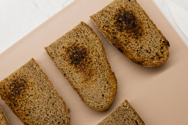 istock Fried slices of rye bread. Top view 1401343278