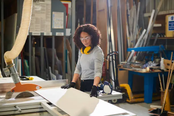 female carpenter in woodshop