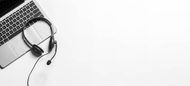 istock Headset and customer support equipment at call center ready for actively service , Communication support, call center and customer service help desk. for (call center) concept . 1401346279
