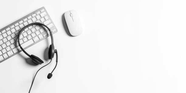 istock Headset and customer support equipment at call center ready for actively service , Communication support, call center and customer service help desk. for (call center) concept . 1401346280