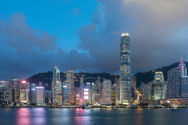 istock Scenery of Victoria harbor of Hong Kong city at dusk 1401347325