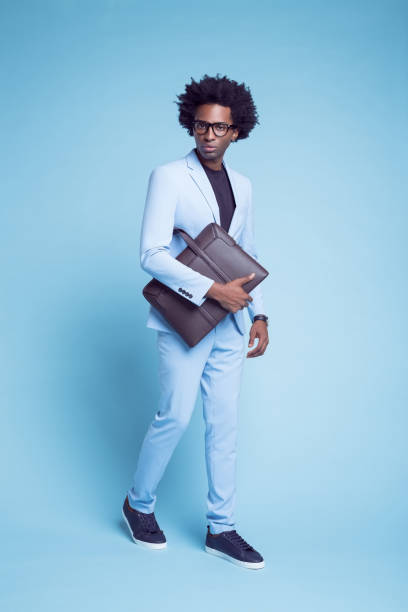 istock Portrait of businessman with briefcase 1401349332