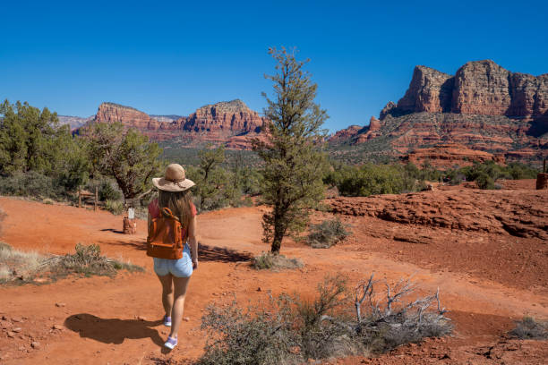 istock Girl on spring hiking trip in red mountains. 1401350165