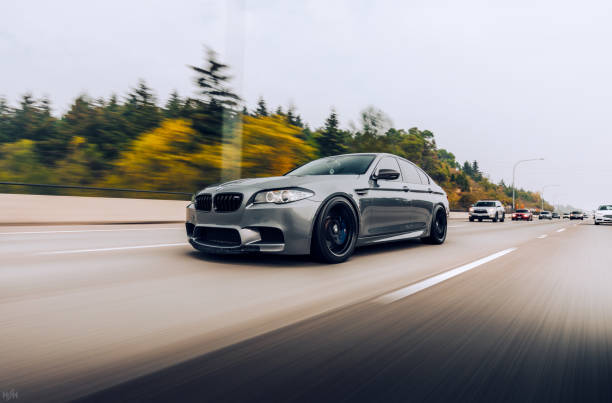 Grey BMW M5 Seattle, WA, USA
5/12/2022
M5 driving on the highway with trees in the background bmw stock pictures, royalty-free photos & images