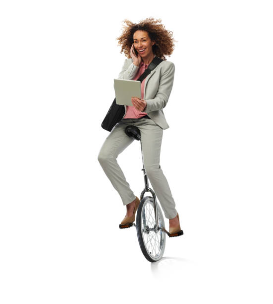 一輪車ビジネスウーマン - unicycle unicycling cycling wheel ストックフォトと画像