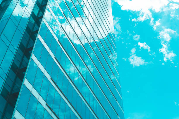 istock underside panoramic and perspective view to steel blue glass high rise building skyscrapers 1401356500