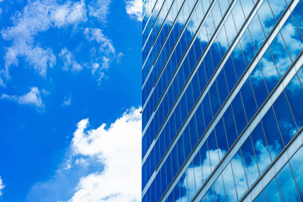 istock underside panoramic and perspective view to steel blue glass high rise building skyscrapers 1401356888